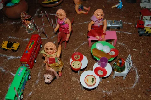 A tiered Golu display of dolls and figurines set up for Navaratri in a South Indian home